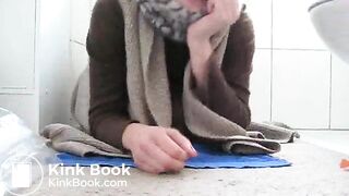 girl shits in a bag in her bathroom