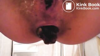 Huge turds fall from her small asshole