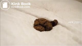 Sexy blonde pooping on the bed