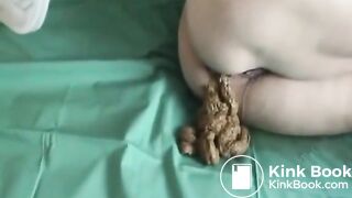 Girl shitting in her bed