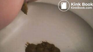 Women shitting on toilet