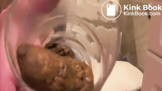 Girl fills up a glass with her poo