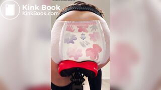 Girl poops diaper on bike