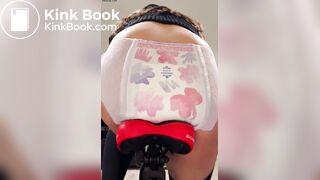 Girl poops diaper on bike
