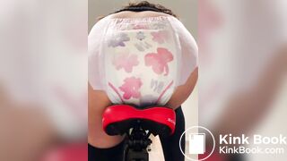 Girl poops diaper on bike