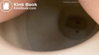 Girl shitting into toilet