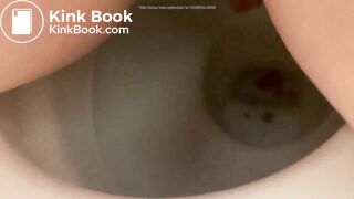 Girl shitting into toilet