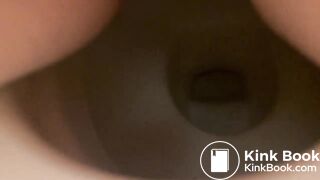 Girl shitting into toilet