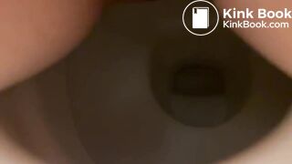 Girl shitting into toilet