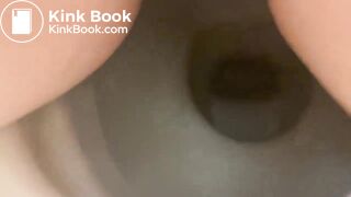 Girl shitting into toilet