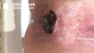 girl dropping her poop in the toilet