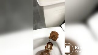 Hot MILF spreads her ass on the toilet