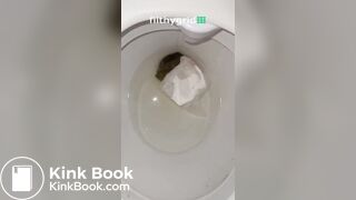 Sexy ebony on toilet