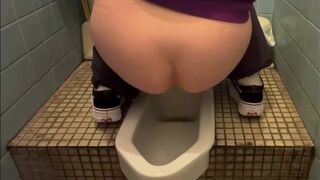 Asian girl pooping on squat toilet