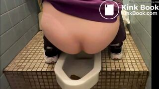 Asian girl pooping on squat toilet
