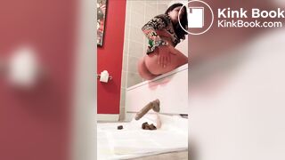 Girl shitting on dildo