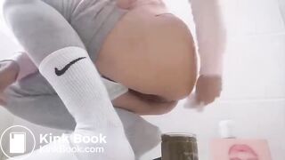 Filling A Jar With Her Shit
