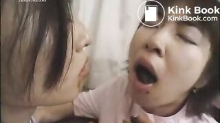 two japanese nurses playing with scat