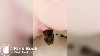 Pretty girl farting and poping on the toiletbowl