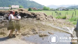 Two girls sprayed with cowshit by a slurry tanker