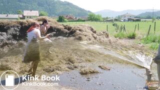 Two girls sprayed with cowshit by a slurry tanker