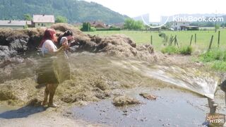 Two girls sprayed with cowshit by a slurry tanker