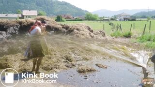 Two girls sprayed with cowshit by a slurry tanker