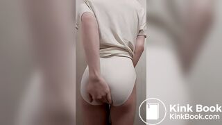 Girl pooping in white pants