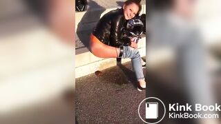 Beautiful female rider poops outdoors.