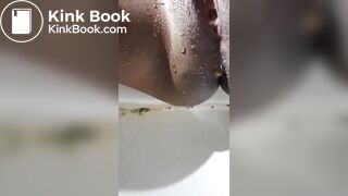 Malay mistress performing scat on toilet
