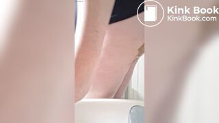 Woman playing with shit