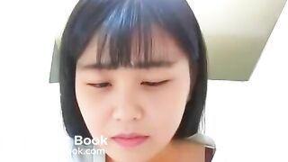 Asian girl dropping a nice log in the toilet