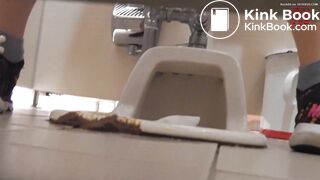 A girl who pooped outside the toilet bowl