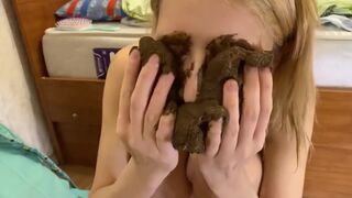 Hot girl shitting on floor and smearing it on herself