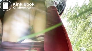 Woman pooping by the car