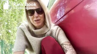 Woman pooping by the car