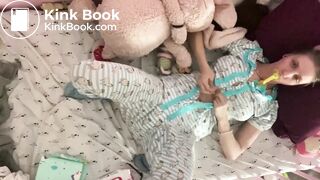 Mindlessly Diapered change her poopy nappy