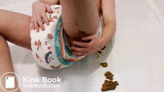 AB boy smearing shit from his very messy diaper