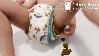 AB boy smearing shit from his very messy diaper