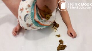 AB boy smearing shit from his very messy diaper