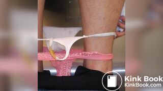 Diarrea en baño público con hilo blanco